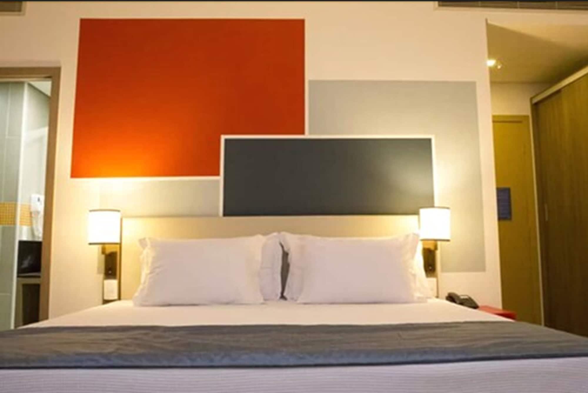 מלון Tryp By Wyndham ריבייראו פרטו מראה חיצוני תמונה A room at the hotel