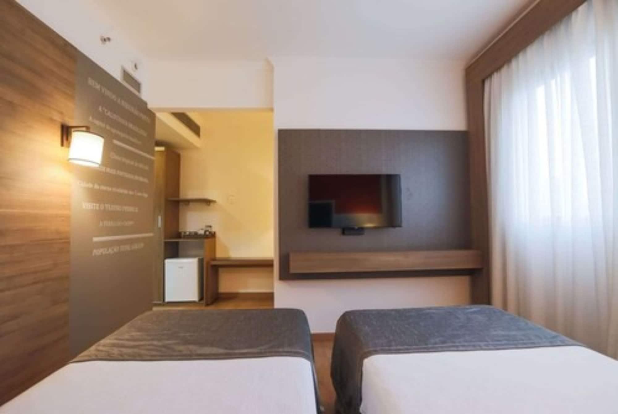 מלון Tryp By Wyndham ריבייראו פרטו מראה חיצוני תמונה A typical room at the hotel