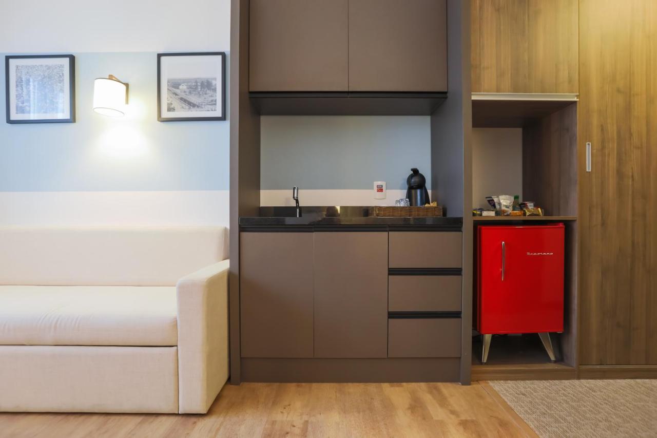 מלון Tryp By Wyndham ריבייראו פרטו מראה חיצוני תמונה A kitchenette in a hotel room