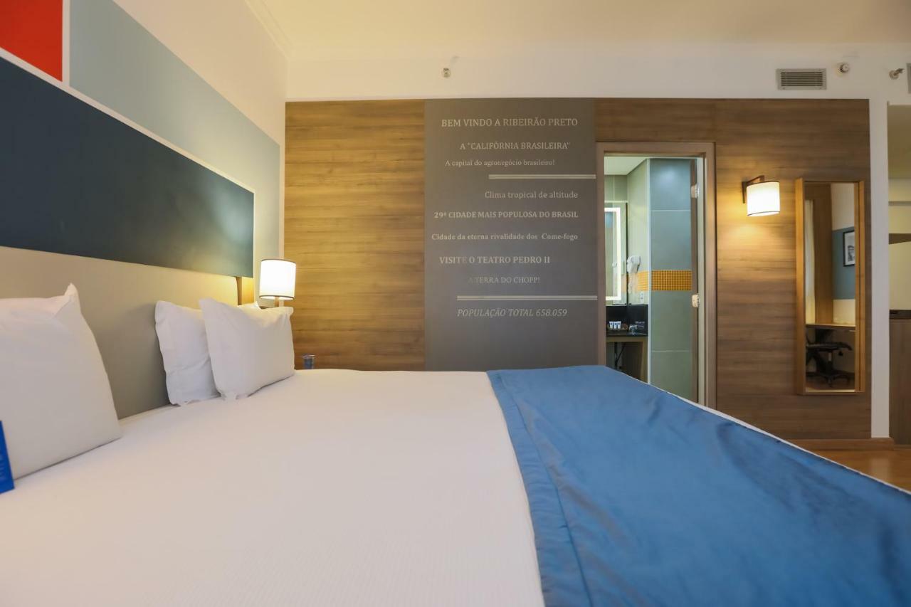 מלון Tryp By Wyndham ריבייראו פרטו מראה חיצוני תמונה A room at the hotel