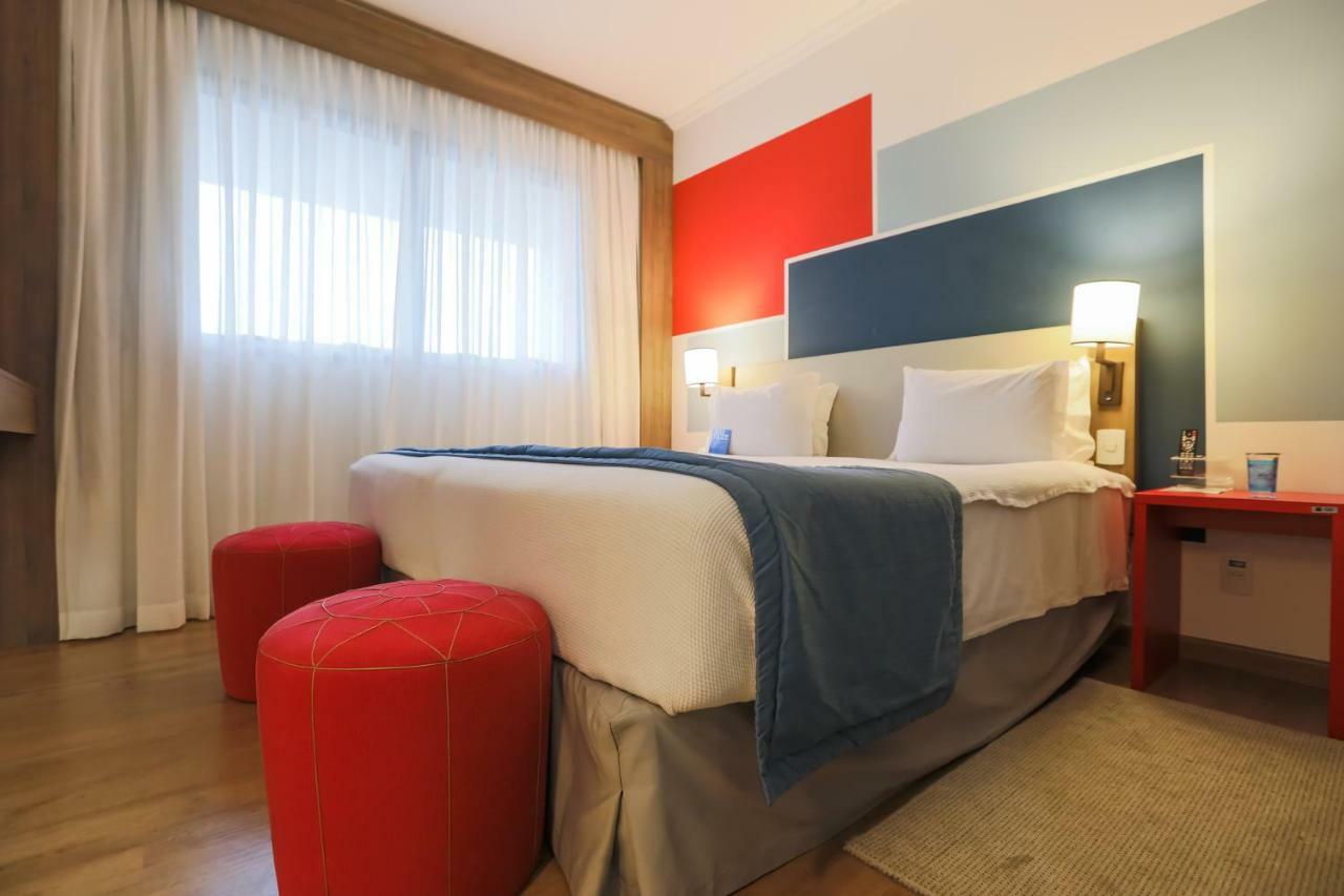 מלון Tryp By Wyndham ריבייראו פרטו מראה חיצוני תמונה A room at the hotel