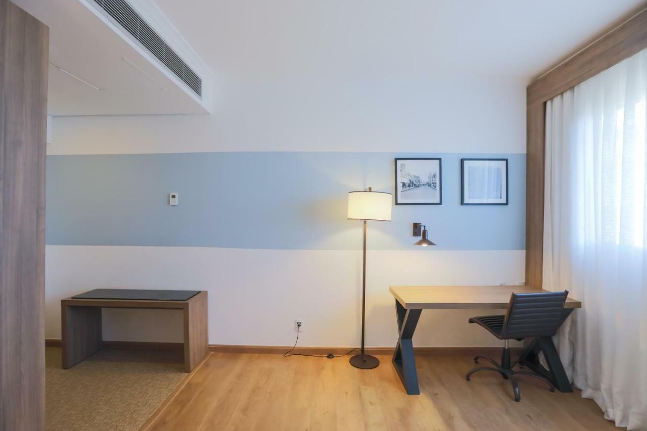מלון Tryp By Wyndham ריבייראו פרטו מראה חיצוני תמונה A room at the hotel