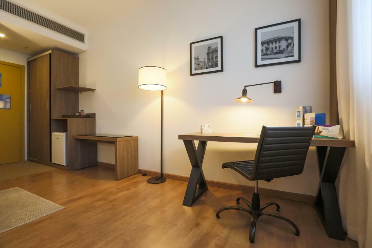 מלון Tryp By Wyndham ריבייראו פרטו מראה חיצוני תמונה A room at the hotel